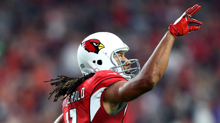 Dec 3, 2017; Glendale, AZ, USA; Arizona Cardinals wide receiver Larry Fitzgerald celebrates after catching a touchdown pass against the Los Angeles Rams in the second quarter at University of Phoenix Stadium. Mandatory Credit: Mark J. Rebilas-Imagn Images