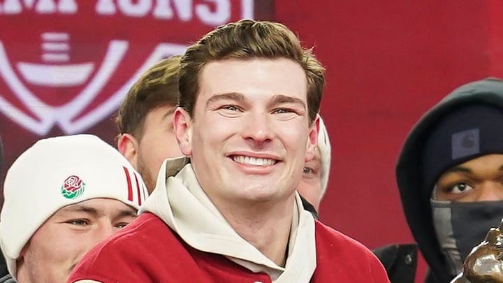 Jan 24, 2026; Bloomington, IN, USA; Indiana Hoosiers quarterback Fernando Mendoza (15) holds the Heisman Trophy with Indiana Hoosiers head coach Curt Cignetti on Saturday, Jan. 24, 2026, during the Indiana Football College Football Playoff National Championship celebration and parade at Memorial Stadium. Mandatory Credit: Grace Hollars-USA TODAY Network via Imagn Images Jan 24, 2026; Bloomington, IN, USA; Indiana Hoosiers quarterback Fernando Mendoza (15) holds the Heisman Trophy with Indiana Hoosiers head coach Curt Cignetti on Saturday, Jan. 24, 2026, during the Indiana Football College Football Playoff National Championship celebration and parade at Memorial Stadium. Mandatory Credit: Grace Hollars-USA TODAY Network via Imagn Images