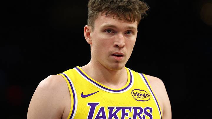 Dec 23, 2025; Phoenix, Arizona, USA; Los Angeles Lakers forward Dalton Knecht (4) against the Phoenix Suns at Mortgage Matchup Center. Mandatory Credit: Mark J. Rebilas-Imagn Images Dec 23, 2025; Phoenix, Arizona, USA; Los Angeles Lakers forward Dalton Knecht (4) against the Phoenix Suns at Mortgage Matchup Center. Mandatory Credit: Mark J. Rebilas-Imagn Images