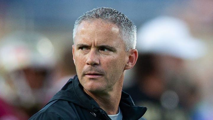 Florida State Seminoles head coach Mike Norvell leads warmups before the Seminoles take on the LSU Tigers on Sunday, Sept. 3, 2023 at Camping World Stadium.
