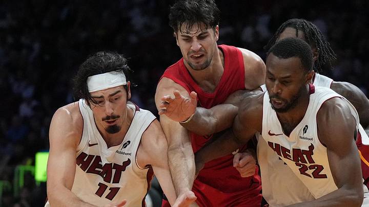 Nov 8, 2025; Miami, Florida, USA; Miami Heat forward Jaime Jaquez Jr. (11) and forward Andrew Wiggins (22) battle for possession with Portland Trail Blazers forward Deni Avdija (8) as center Donovan Clingan (23) looks on during the second half at Kaseya Center. Mandatory Credit: Jim Rassol-Imagn Images Nov 8, 2025; Miami, Florida, USA; Miami Heat forward Jaime Jaquez Jr. (11) and forward Andrew Wiggins (22) battle for possession with Portland Trail Blazers forward Deni Avdija (8) as center Donovan Clingan (23) looks on during the second half at Kaseya Center. Mandatory Credit: Jim Rassol-Imagn Images