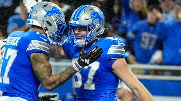Detroit Lions tight end Sam LaPorta (87) celebrates his touchdown in the first half against Chicago Bears on Thanksgiving Day at Ford Field in Detroit on Thursday, Nov. 28, 2024.