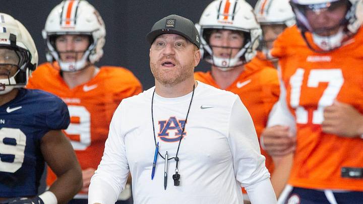 Auburn Tigers head coach Alex Golesh talks with his team during practice at Woltosz Football Performance Center in Auburn, Ala. on Thursday, April 16, 2026.