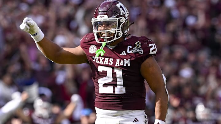 Dec 20, 2025; College Station, TX, USA; Texas A&M Aggies linebacker Taurean York (21) celebrates during the game between the Aggies and the Hurricanes at Kyle Field. 