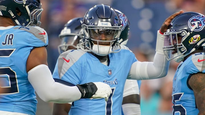 Tennessee Titans quarterback Cam Ward (1) gets into position for the first play of the pre-season game against the Minnesota Vikings at Nissan Stadium in Nashville, Tenn., Friday, Aug. 22, 2025.