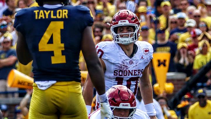 Oklahoma quarterback John Mateer prepares for a snap against Michigan. Oklahoma quarterback John Mateer prepares for a snap against Michigan.