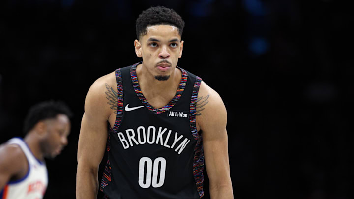 Mar 20, 2026; Brooklyn, New York, USA; Brooklyn Nets forward Josh Minott (00) reacts after making a three point basket during the first half against the New York Knicks at Barclays Center. Mandatory Credit: Vincent Carchietta-Imagn Images