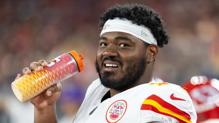 Aug 9, 2025; Glendale, Arizona, USA; Kansas City Chiefs guard Jaylon Moore (77) against the Arizona Cardinals during a preseason NFL game at State Farm Stadium. Mandatory Credit: Mark J. Rebilas-Imagn Images