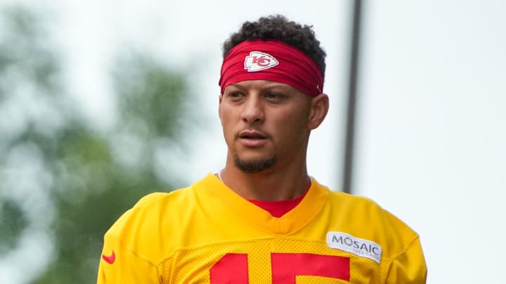 Jul 22, 2025; St. Joseph, MO, USA; Kansas City Chiefs quarterbacks Chris Oladokun (19), Bailey Zappe (14), and Patrick Mahomes (15) walk down the hill to the fields prior to training camp at Missouri Western State University. Mandatory Credit: Denny Medley-Imagn Images Jul 22, 2025; St. Joseph, MO, USA; Kansas City Chiefs quarterbacks Chris Oladokun (19), Bailey Zappe (14), and Patrick Mahomes (15) walk down the hill to the fields prior to training camp at Missouri Western State University. Mandatory Credit: Denny Medley-Imagn Images