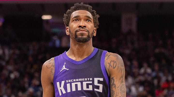 Mar 20, 2025; Sacramento, California, USA; Sacramento Kings guard Malik Monk (0) looks on during the second quarter of the game against the Chicago Bulls at Golden 1 Center. Mandatory Credit: Ed Szczepanski-Imagn Images