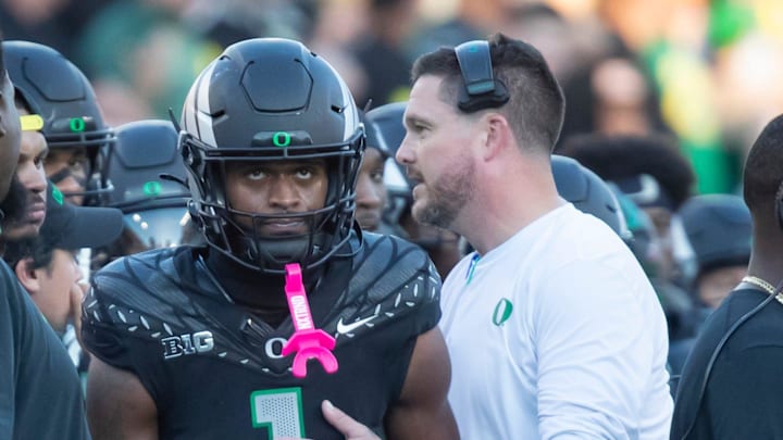 Oregon Ducks head coach Dan Lanning and Oregon Ducks wide receiver Traeshon Holden as Holden is ejected over a spitting incident as the No. 3 Oregon Ducks host the No. 2 Ohio State Buckeyes Saturday, Oct. 12, 2024 at Autzen Stadium in Eugene, Ore.