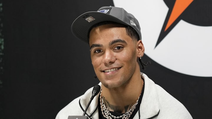 Feb 2, 2026; San Jose, CA, USA; New England Patriots cornerback Christian Gonzalez (0) speaks to media during Opening Night for Super Bowl LX at San Jose Convention Center. Mandatory Credit: Kyle Terada-Imagn Images