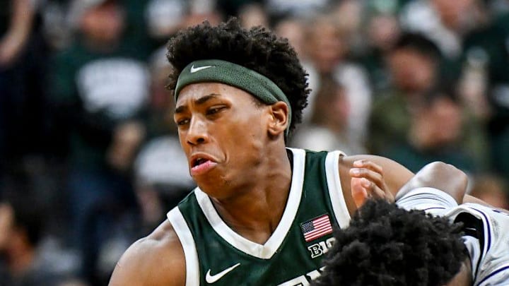 Michigan State's Jeremy Fears Jr., left, collides with Northwestern's Jayden Reid during the first half on Thursday, Jan. 8, 2026, at the Breslin Center in East Lansing.