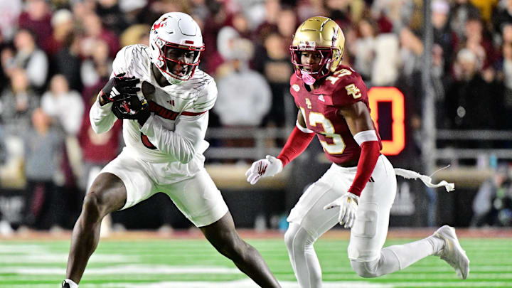 Oct 25, 2024; Chestnut Hill, Massachusetts, USA; Louisville Cardinals wide receiver Chris Bell (0) runs after making a catch against the Boston College Eagles during the first half at Alumni Stadium. Mandatory Credit: Eric Canha-Imagn Images