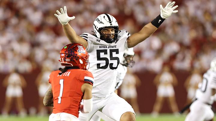 Sep 27, 2025; Ames, Iowa, USA; Iowa State Cyclones defensive lineman Jace J. Gilbert (55) defends a pass from Arizona Wildcats quarterback Noah Fifita (1) during the second half at Jack Trice Stadium. Mandatory Credit: Reese Strickland-Imagn Images Sep 27, 2025; Ames, Iowa, USA; Iowa State Cyclones defensive lineman Jace J. Gilbert (55) defends a pass from Arizona Wildcats quarterback Noah Fifita (1) during the second half at Jack Trice Stadium. Mandatory Credit: Reese Strickland-Imagn Images