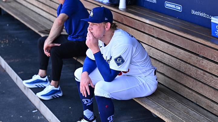 Jun 7, 2026; Los Angeles, California, USA;  Los Angeles Dodgers pitcher Emmet Sheehan (80) sits in the dugout after being taken out of the game in the second inning of a game against the Los Angeles Angels at Dodger Stadium. Mandatory Credit: William Liang-Imagn Images