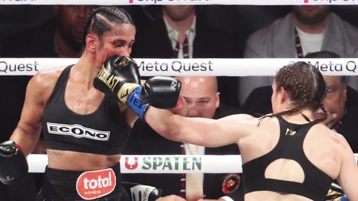 Nov 15, 2024; Arlington, Texas, UNITED STATES; Amanda Serrano (red gloves) fights Katie Taylor (blue gloves) at AT&T Stadium. Mandatory Credit: Kevin Jairaj-Imagn Images Nov 15, 2024; Arlington, Texas, UNITED STATES; Amanda Serrano (red gloves) fights Katie Taylor (blue gloves) at AT&T Stadium. Mandatory Credit: Kevin Jairaj-Imagn Images