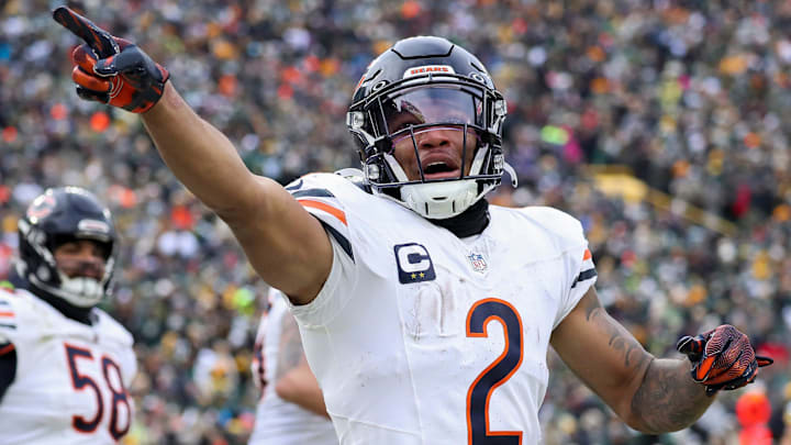 Chicago Bears wide receiver DJ Moore gestures to the crowd after scoring a touchdown against the Green Bay Packers.