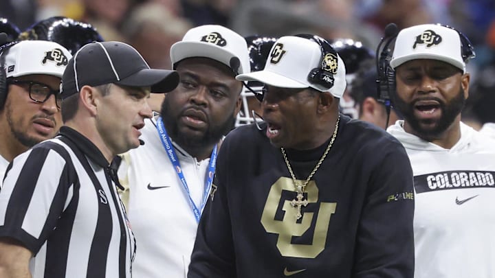Colorado Buffaloes coach Deion Sanders reacts with an official after a play during the second quarter against the Brigham Young Cougars at Alamodome. Colorado Buffaloes coach Deion Sanders reacts with an official after a play during the second quarter against the Brigham Young Cougars at Alamodome.