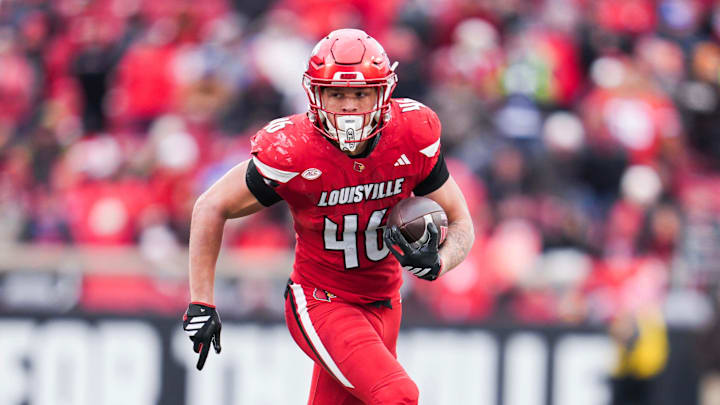 Louisville Cardinals running back Braxton Jennings (46) runs for a gain against Kentucky as the Louisville Cardinals football team dominated the Wildcats 41-0 Saturday, November 29, 2025 in Louisville, Kentucky at L&N Federal Credit Union Stadium.