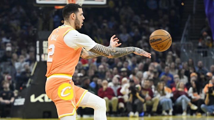 Dec 22, 2025; Cleveland, Ohio, USA; Cleveland Cavaliers guard Lonzo Ball (2) throws a pass in the first quarter against the Charlotte Hornets at Rocket Arena. Mandatory Credit: David Richard-Imagn Images