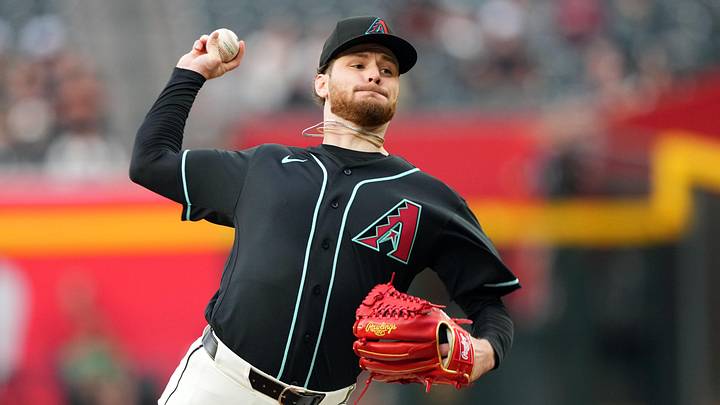 May 19, 2026; Phoenix, Arizona, USA; Arizona Diamondbacks pitcher Ryne Nelson (19) pitches against the San Francisco Giants during the first inning at Chase Field. Mandatory Credit: Joe Camporeale-Imagn Images