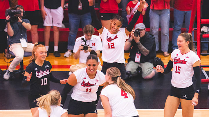 Nebraska volleyball players celebrate during a 4-0 win over South Dakota State at Ord High School on May 3, 2025. Nebraska volleyball players celebrate during a 4-0 win over South Dakota State at Ord High School on May 3, 2025.