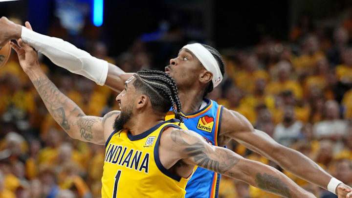 Jun 13, 2025; Indianapolis, Indiana, USA; Indiana Pacers forward Obi Toppin (1) reaches for the ball against Oklahoma City Thunder guard Shai Gilgeous-Alexander (2) during the second half during game four of the 2025 NBA Finals at Gainbridge Fieldhouse. Mandatory Credit: Kyle Terada-Imagn Images