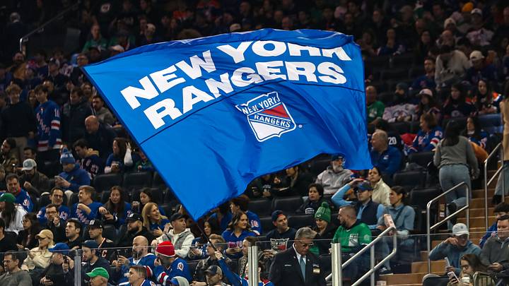 Mar 16, 2025; New York, New York, USA; A New York Rangers flag is seen in the crown during the first period against the Edmonton Oilers at Madison Square Garden. Mar 16, 2025; New York, New York, USA; A New York Rangers flag is seen in the crown during the first period against the Edmonton Oilers at Madison Square Garden.