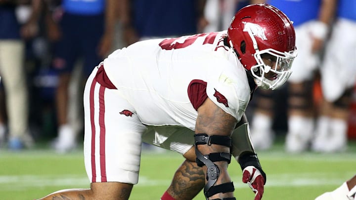 Arkansas Razorbacks defensive lineman Ian Geffrard (95) waits for the snap during the third quarter during the third quarter at Vaught-Hemingway Stadium.