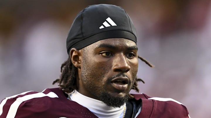 Texas A&M Aggies running back Le'Veon Moss (8) looks on prior to the game against the Florida Gators at Kyle Field. Mandatory Credit: Maria Lysaker-Imagn Images Texas A&M Aggies running back Le'Veon Moss (8) looks on prior to the game against the Florida Gators at Kyle Field. Mandatory Credit: Maria Lysaker-Imagn Images