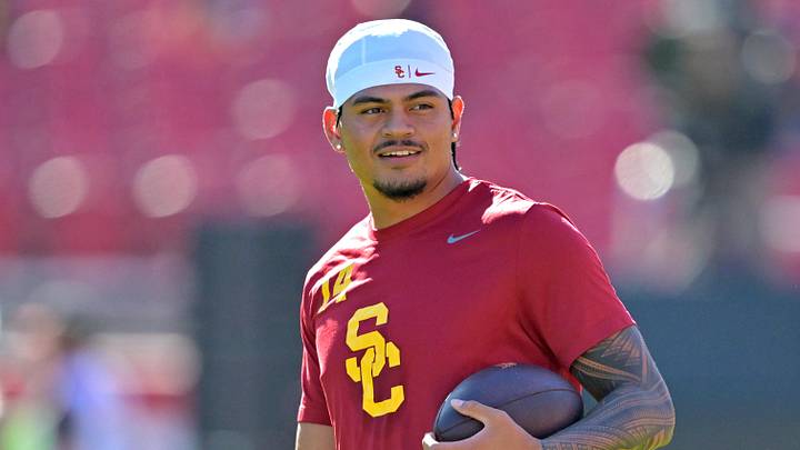Oct 11, 2025; Los Angeles, California, USA;  USC Trojans quarterback Jayden Maiava (14) warms up prior to the game against the Michigan Wolverines at United Airlines Field at the Los Angeles Memorial Coliseum. Mandatory Credit: Jayne Kamin-Oncea-Imagn Images