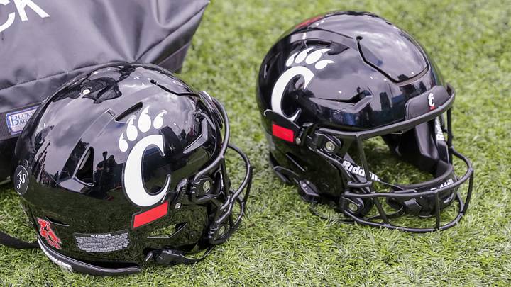 Oct 30, 2021; New Orleans, Louisiana, USA; Cincinnati Bearcats helmets on the ground during the game against Tulane Green Wave during the second half at Yulman Stadium. Mandatory Credit: Stephen Lew-Imagn Images Oct 30, 2021; New Orleans, Louisiana, USA; Cincinnati Bearcats helmets on the ground during the game against Tulane Green Wave during the second half at Yulman Stadium. Mandatory Credit: Stephen Lew-Imagn Images