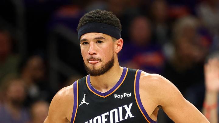 Phoenix Suns guard Devin Booker reacts against the Portland Trail Blazers in the first half during the play-in rounds of the 2026 NBA Playoffs at Mortgage Matchup Center on April 14, 2026. Phoenix Suns guard Devin Booker reacts against the Portland Trail Blazers in the first half during the play-in rounds of the 2026 NBA Playoffs at Mortgage Matchup Center on April 14, 2026.