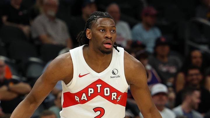 Mar 22, 2026; Phoenix, Arizona, USA; Toronto Raptors forward Jonathan Mogbo (2) dribbles against Phoenix Suns guard Jamaree Bouyea (17) during the fourth quarter at Mortgage Matchup Center. Mandatory Credit: Anna Carrington-Imagn Images Mar 22, 2026; Phoenix, Arizona, USA; Toronto Raptors forward Jonathan Mogbo (2) dribbles against Phoenix Suns guard Jamaree Bouyea (17) during the fourth quarter at Mortgage Matchup Center. Mandatory Credit: Anna Carrington-Imagn Images