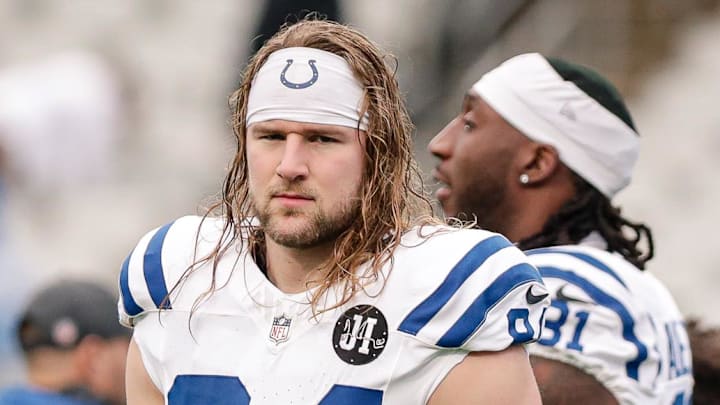 Indianapolis Colts tight end Tyler Warren stands on the field