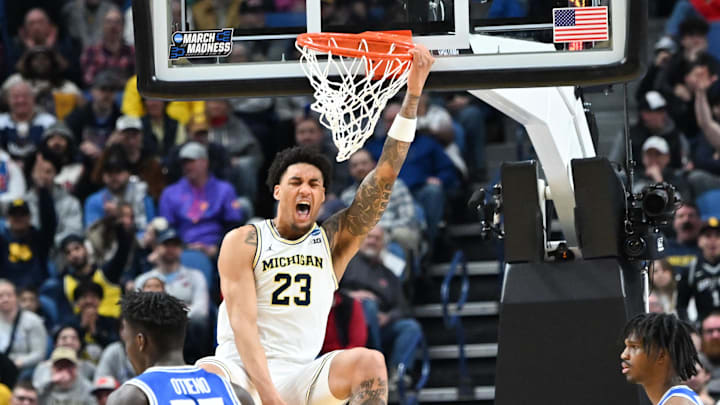Mar 21, 2026; Buffalo, NY, USA; Michigan Wolverines forward Yaxel Lendeborg (23) reacts after a dunk in the first half against the Saint Louis Billikens during a second round game of the men's 2026 NCAA Tournament at Keybank Center. Mandatory Credit: Mark Konezny-Imagn Images
