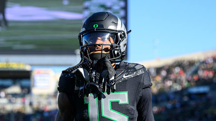 Oregon Ducks wide receiver Tez Johnson warms hip before the game against the Ohio State Buckeyes,