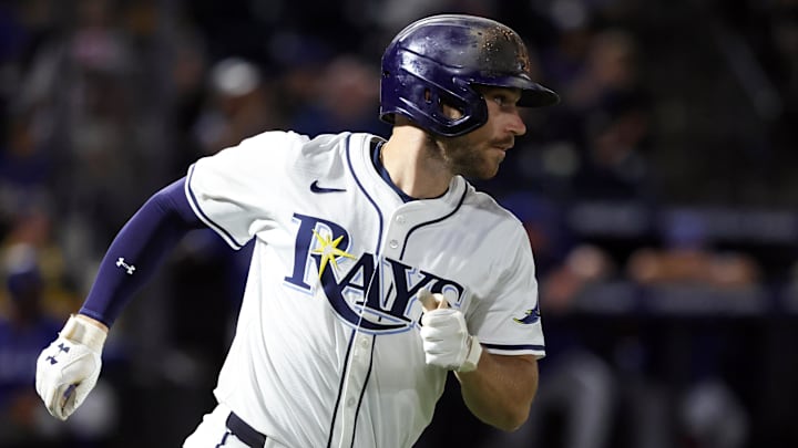 Sep 16, 2025; St. Petersburg, Florida, USA; Tampa Bay Rays second baseman Brandon Lowe (8) hits a RBI single ninth inning against the Toronto Blue Jays at George M. Steinbrenner Field. 