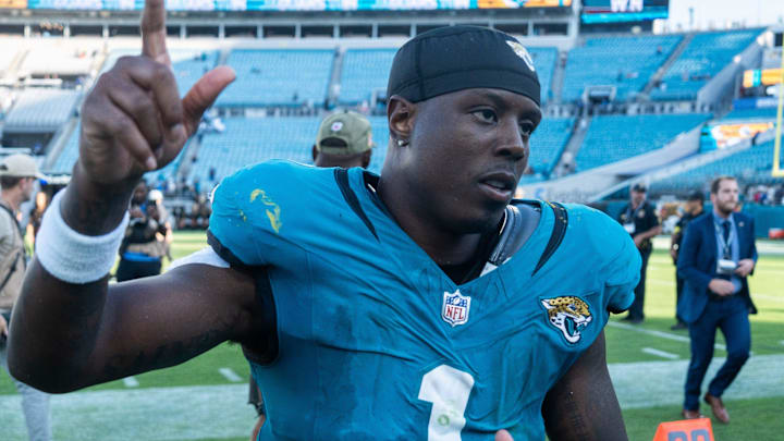 Jacksonville Jaguars running back Travis Etienne Jr. (1) runs off the field after the Jaguars defeated the Charger 35-6. [Doug Engle/Florida Times-Union]