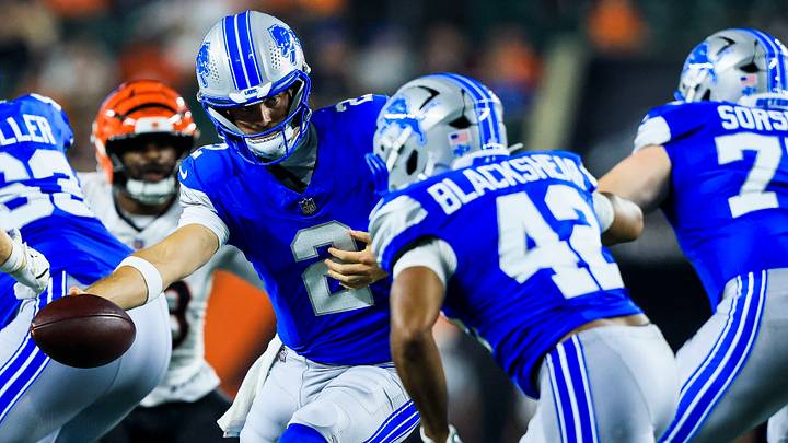 Detroit Lions quarterback Luke Altmyer (2) hands the ball off to running back Raheem Blackshear (42) against Bengals Detroit Lions quarterback Luke Altmyer (2) hands the ball off to running back Raheem Blackshear (42) against Bengals