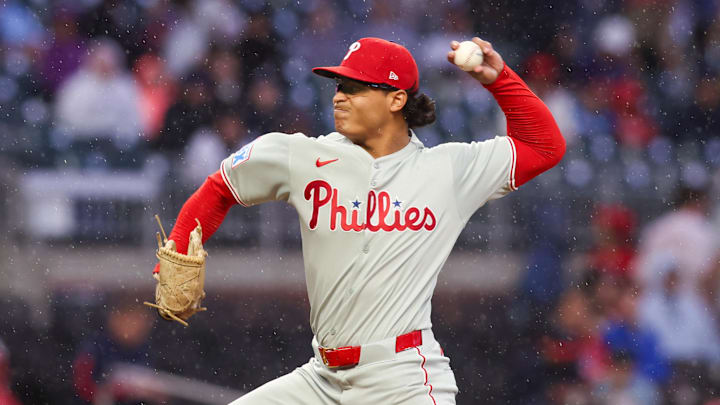 Apr 10, 2025; Atlanta, Georgia, USA; Philadelphia Phillies starting pitcher Jesus Luzardo (44) throws in a light rain against the Atlanta Braves in the second inning at Truist Park. 