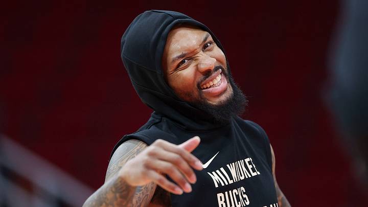 Jan 6, 2024; Houston, Texas, USA; Milwaukee Bucks guard Damian Lillard (0) smiles on the court before the game against the Houston Rockets at Toyota Center. Mandatory Credit: Troy Taormina-USA TODAY Sports