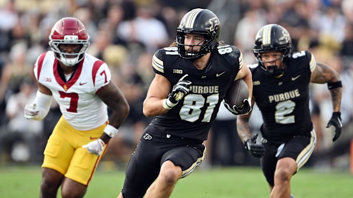 Purdue Boilermakers tight end George Burhenn (81) runs the ball 