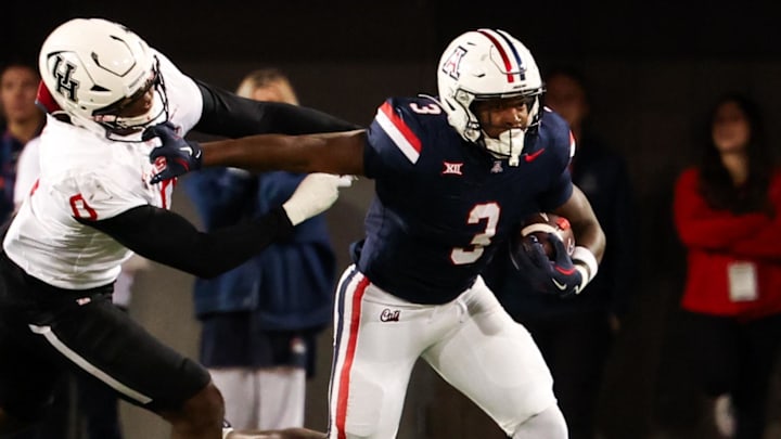 Nov 15, 2024; Tucson, Arizona, USA; Arizona Wildcats running back Kedrick Reescano (3) runs with the ball during the fourth quarter against the Houston Cougars at Arizona Stadium. Mandatory Credit: Aryanna Frank-Imagn Images