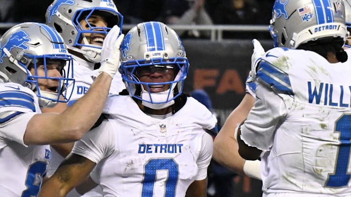 Detroit Lions running back Jahmyr Gibbs (0) celebrates with teammates after scoring a touchdown 