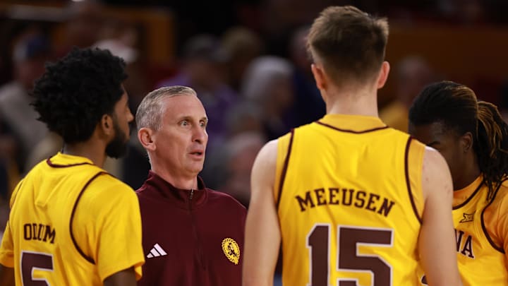 Jan 10, 2026; Tempe, Arizona, USA; Arizona State Sun Devils head coach Bobby Hurley in the huddle with his players against the Kansas State Wildcats in the first half at Desert Financial Arena. Mandatory Credit: Mark J. Rebilas-Imagn Images