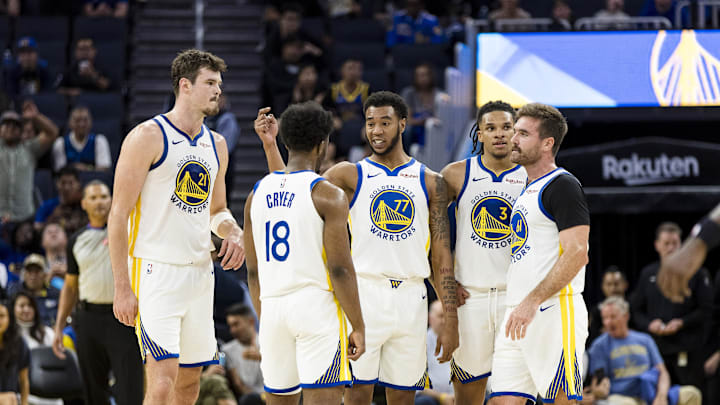Oct 8, 2025; San Francisco, California, USA; Golden State Warriors guard Taevion Kinsey (77) huddles with guard LJ Cryer (18), center Quinten Post (21), guard Will Richard (3), and guard Pat Spencer (61) during the fourth quarter against the Portland Trail Blazers at Chase Center. Mandatory Credit: John Hefti-Imagn Images Oct 8, 2025; San Francisco, California, USA; Golden State Warriors guard Taevion Kinsey (77) huddles with guard LJ Cryer (18), center Quinten Post (21), guard Will Richard (3), and guard Pat Spencer (61) during the fourth quarter against the Portland Trail Blazers at Chase Center. Mandatory Credit: John Hefti-Imagn Images
