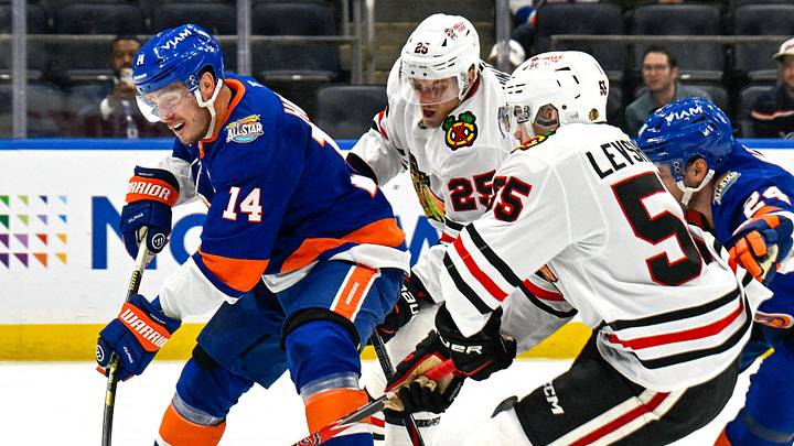 Oct 8, 2026; Elmont, New York, USA; New York Islanders center Bo Horvat (14) attempts a shot defended by Chicago Blackhawks defenseman Artyom Levshunov (55) and Chicago Blackhawks center Dominic Toninato (25) during the second period at UBS Arena. Mandatory Credit: Dennis Schneidler-Imagn Images Oct 8, 2026; Elmont, New York, USA; New York Islanders center Bo Horvat (14) attempts a shot defended by Chicago Blackhawks defenseman Artyom Levshunov (55) and Chicago Blackhawks center Dominic Toninato (25) during the second period at UBS Arena. Mandatory Credit: Dennis Schneidler-Imagn Images