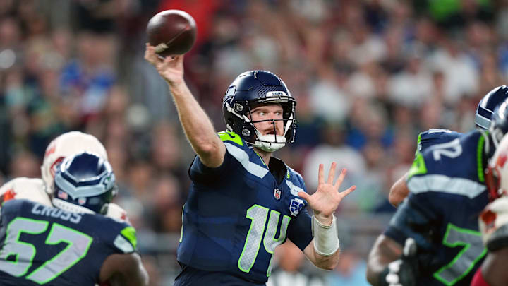 Sep 25, 2025; Glendale, Arizona, USA; Seattle Seahawks quarterback Sam Darnold (14) throws a pass against the Arizona Cardinals in the third quarter at State Farm Stadium.